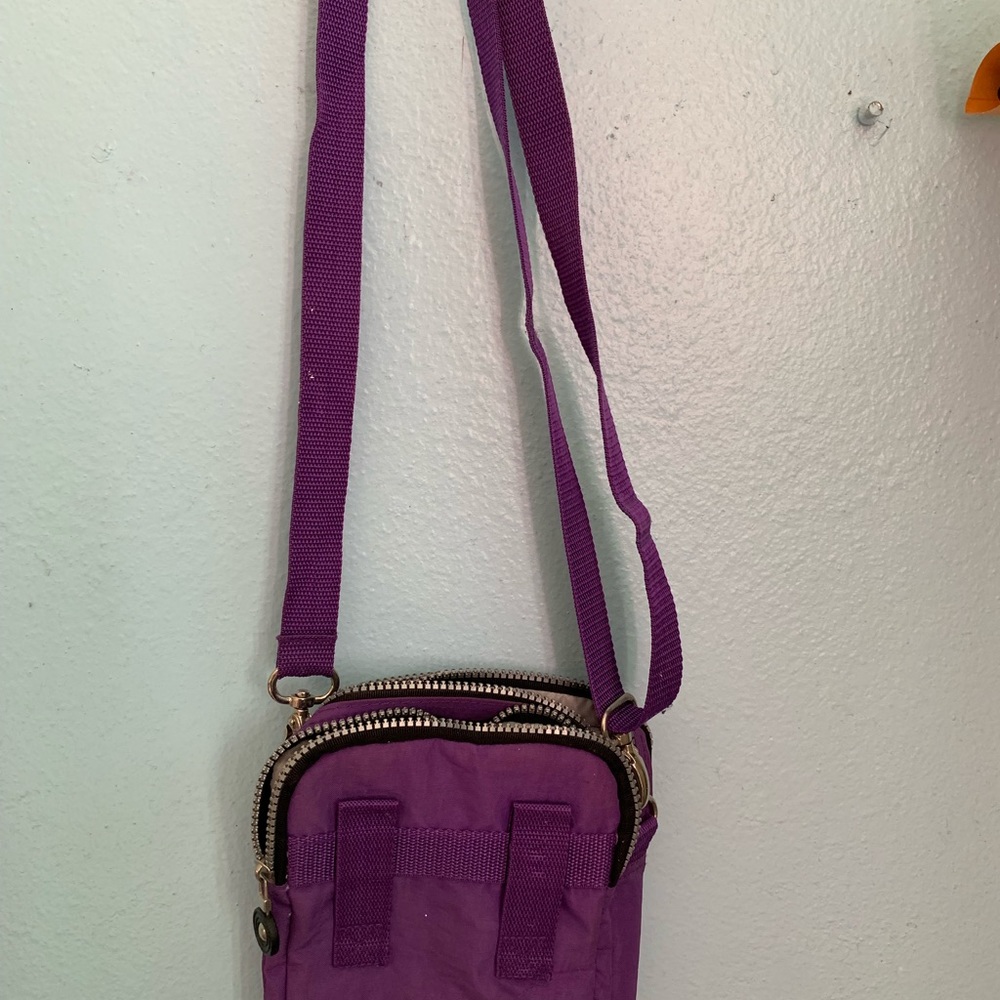 Purple cross body hand bag